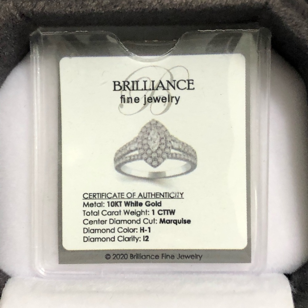 Brand New 10KT Gold Ring w/ 1CTTW Genuine Diamond